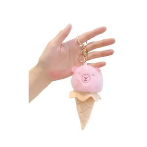 Llavero de peluche Capibara rosa con forma de cono de helado y anilla de metal dorada