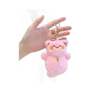 Portachiavi gatto di peluche rosa con campanellino dorato e morbida pelliccia