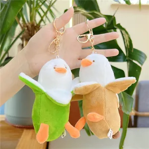 Set di portachiavi a forma di anatra banana in peluche verde e marrone con anello