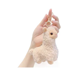 Cute off-white alpaca plush keychain with golden metal clasp for bags and keys