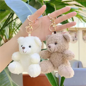 White and brown curly teddy bear plush keychains with golden metal lobster clasps