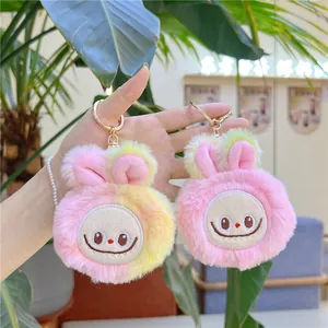 Cute squeaky Labubu plush keychain set with soft fur and pink ears for bags