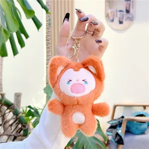 Cute orange plush fox keychain featuring soft fur and golden metal lobster clasp charm