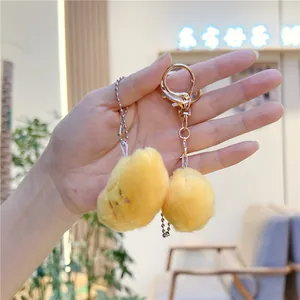 Cute yellow plush ingot doll charms with soft fur and golden lobster clasp for bags