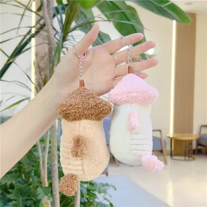 Cute plush mushroom keychain set in brown and pink colors with soft lamb wool texture