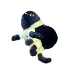 Cute black spider plush keychain with bright green legs and detailed orange eyes