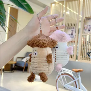 Macro detail of cute plush mushroom keychain with soft texture and metal ring attachment
