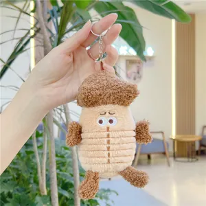 Close-up of a cute acorn plush keychain with expressive eyes and soft texture