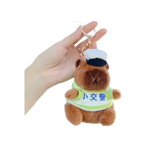 Plush capybara police officer keychain with green striped shirt and white uniform hat