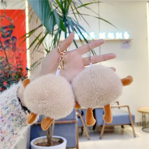 Cute plush boiled egg keychain doll with fluffy khaki fur and sturdy metal ring