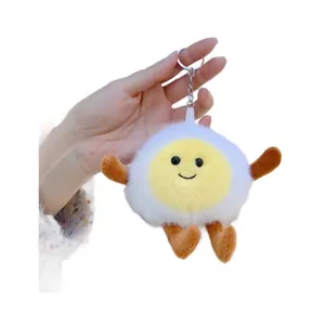 Cute cartoon boiled egg plush keychain with smiling face and brown limbs on white background