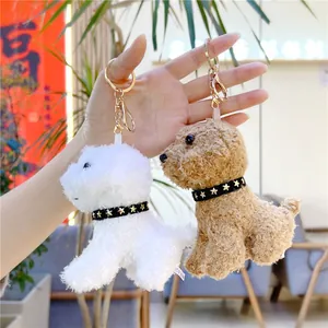 Handheld realistic plush dog keychains in white and beige with golden star collars