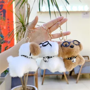 Schattige pluche puppy sleutelhangers met bril en bellen in wit en bruin model