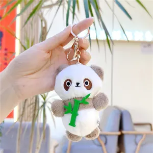 Cute panda plush keychain with green bamboo accessory and golden metal lobster clasp