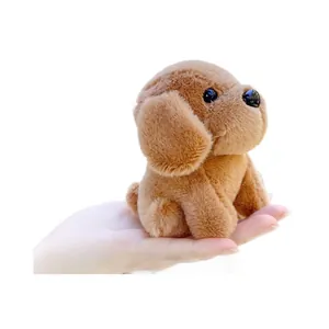 Handheld cute brown puppy plush keychain with soft texture and sit-down posture
