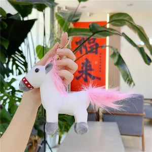 White horse plush keychain with pink mane and golden metal lobster clasp for bags