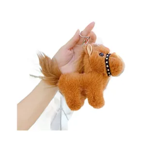 Plush horse keychain in caramel brown with metallic stud bridle and silver ring