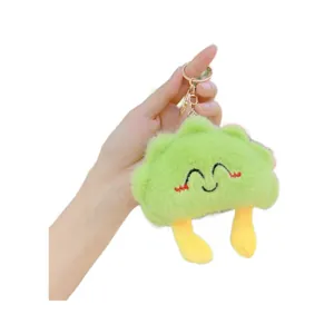 Cute bright green cloud plush keychain with yellow legs and rose gold metal clasp