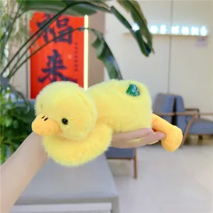 Cute yellow plush duck toy featuring a back storage slot for multi-purpose home use