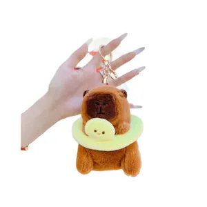 Plush Capybara keychain featuring a yellow swim ring and small duckling accessory