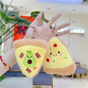 Detailed close-up of cute plush pizza keychains with embroidery and golden metal clips