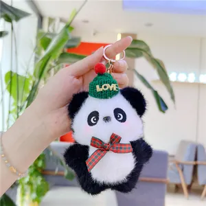 Cute plush panda keychain featuring green knitted hat with LOVE text and plaid bow