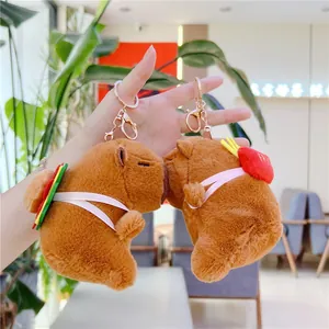 Cute capybara plush keychain set with heart and burger details in soft brown fur