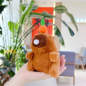 Brown Capybara plush keychain with orange persimmon, soft stuffed toy bag charm