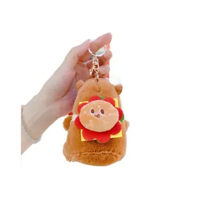Cute Capybara plush keychain featuring a mini burger accessory and golden hook