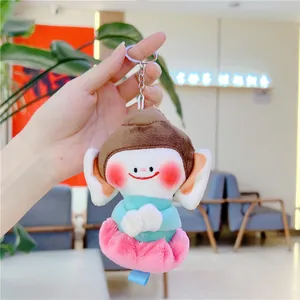 Vue détaillée du pendentif elfe lotus en peluche colorée avec porte-clés en métal doux