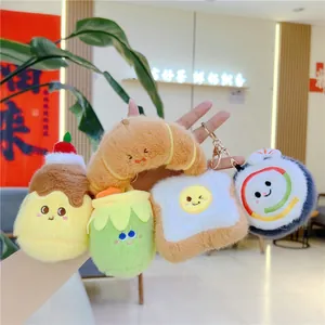 Plush food keychain set featuring croissant toast and sushi with metal hooks