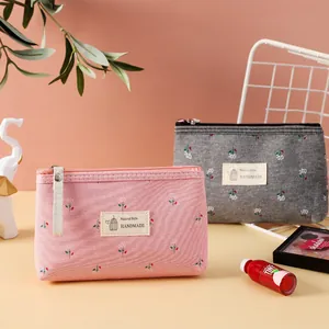 Mini trousse à maquillage en toile florale avec fermeture éclair en rose et gris