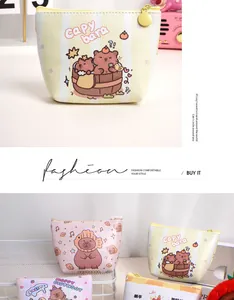 Detail of Capybara coin purses showing lychee-patterned PU leather and various cute patterns