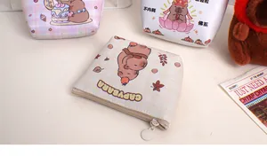 Detailed view of Capybara themed PU leather mini pouches with zipper and cute illustrations