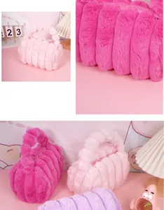 Close-up of soft faux rabbit fur texture and vertical stripes on pastel cosmetic bags