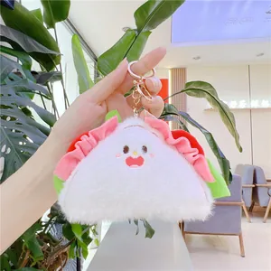 Cute taco plush keychain charm with white fur and pink lace details for bags