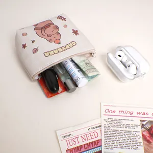 Cute Capybara leather coin purse featuring a cartoon capybara on a checkered background
