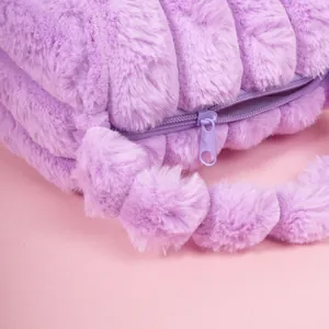 Purple faux rabbit fur cosmetic bag with vertical striped texture and plush handle