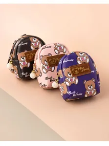 Miniature bear backpack coin purse with pearl zipper charm in black, pink, and purple