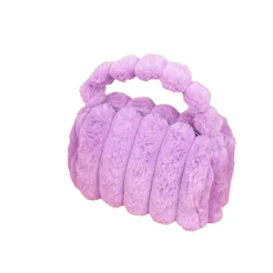 Lavender faux rabbit fur plush handbag with striped texture and twisted handle