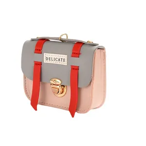 Mini faux leather coin purse charm with pink body, grey flap and gold metal clasp