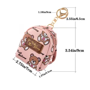 Cute pink mini backpack coin purse with cartoon bear print and gold carabiner