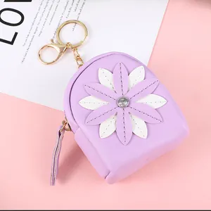 Lavender purple mini coin purse with white daisy applique and rhinestone detail