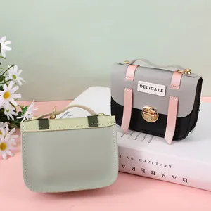 Mini lychee texture PU leather crossbody bag with metal lock and delicate handle
