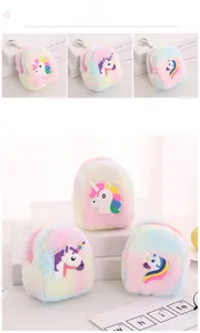 Close-up of plush unicorn mini coin purses with macaron gradient colors and metal keychains