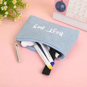 Light blue canvas organizer bag with Best Day print and metal zipper on pink background