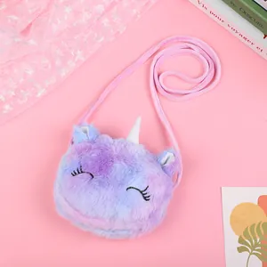 Detail of plush unicorn bag featuring soft purple gradient fur and gold glitter horn