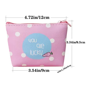 Pink polka dot mini coin purse with lucky carrot print and zipper closure for women