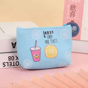 Close-up of a blue PU leather coin purse with lemon print and smooth zipper closure