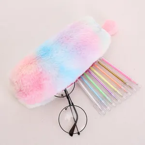 Rainbow gradient plush pencil case detail with soft faux fur and pink pom-pom decor